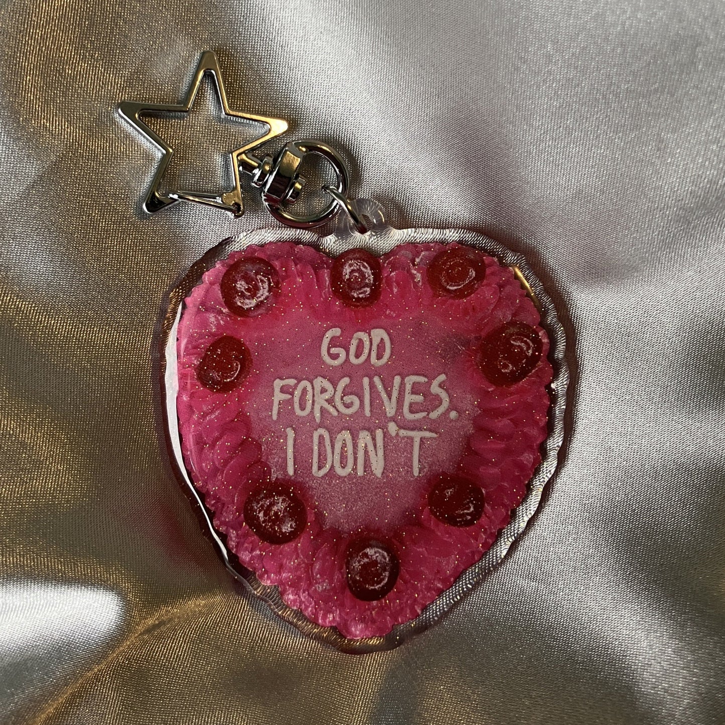 GOD FORGIVES Keychain